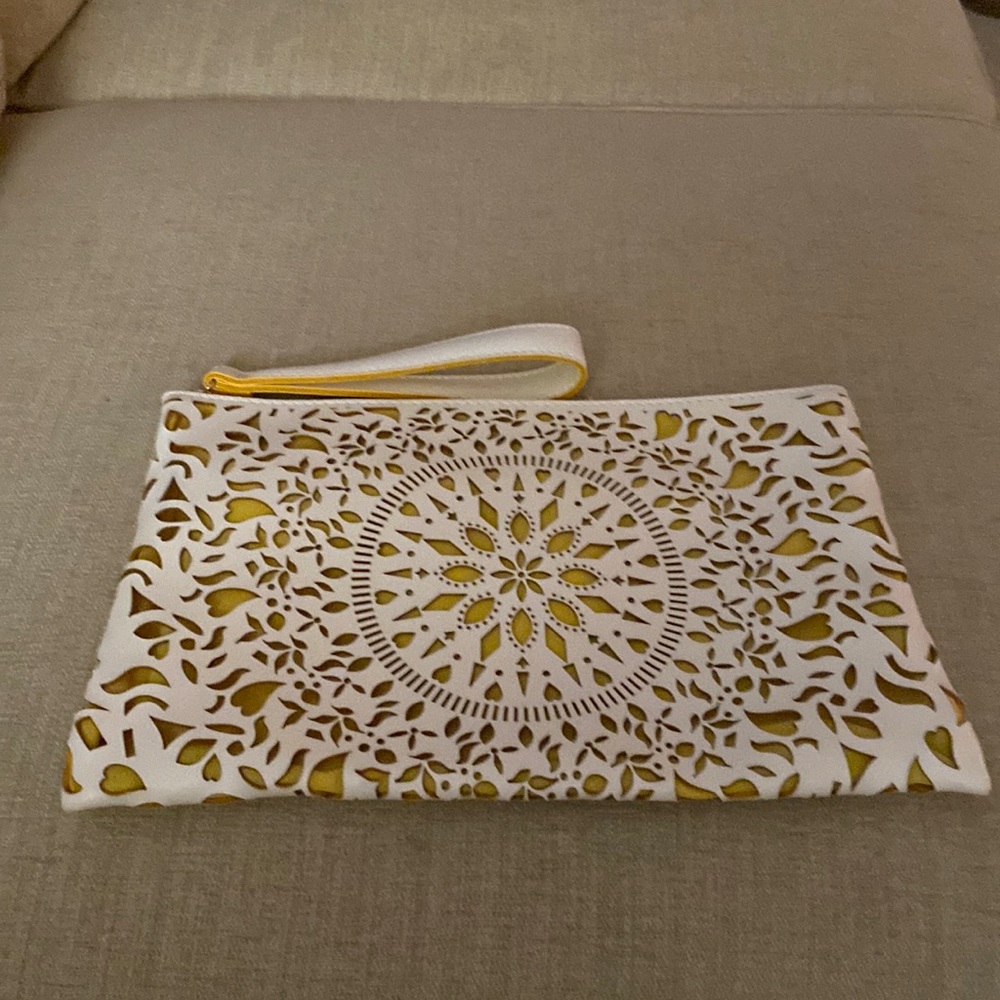 Carlos Santana White and Yellow Pierced Clutch